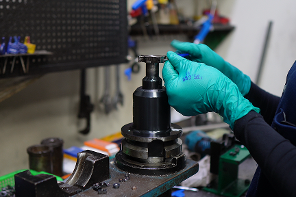 Precision metal manufacturing line with CNC machining equipment